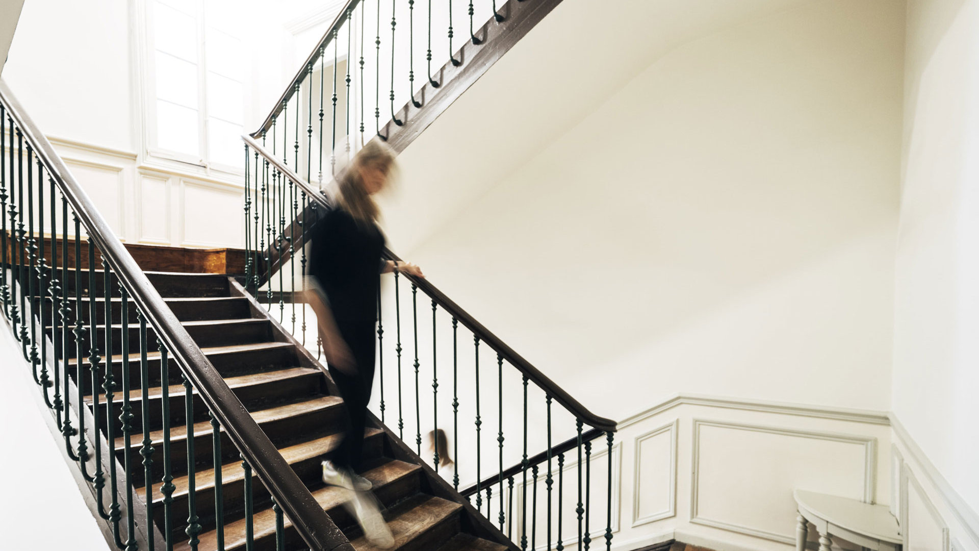 Woman walking down the stairs